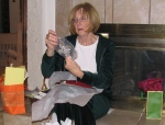 Dee opening her gifts